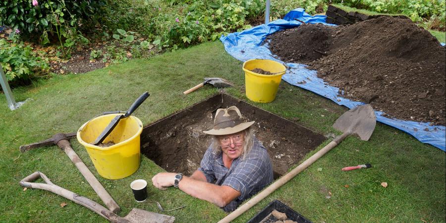 Phil Harding excavating a test pit at Salisbury Museum