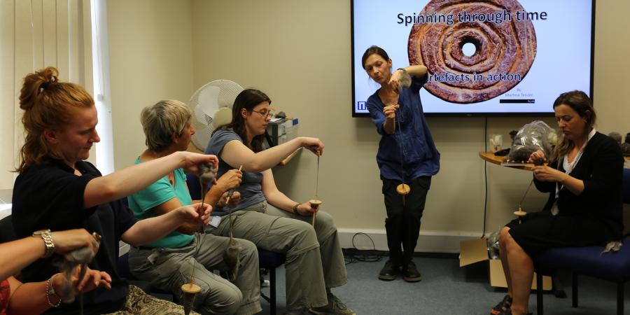 Martina showing staff how to spin during a lunchtime talk