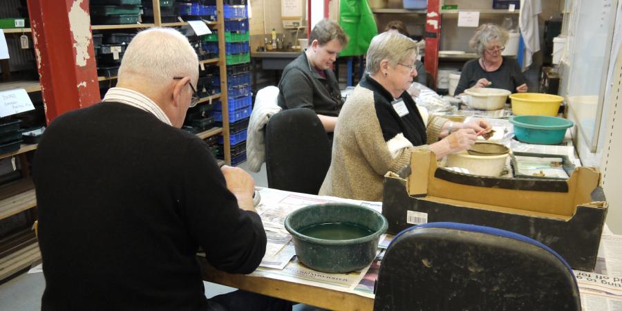 Some of the volunteers cleaning finds