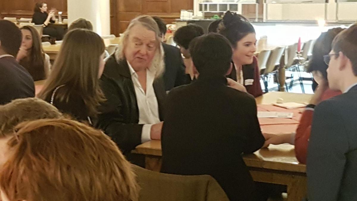 Phil Harding talking to students