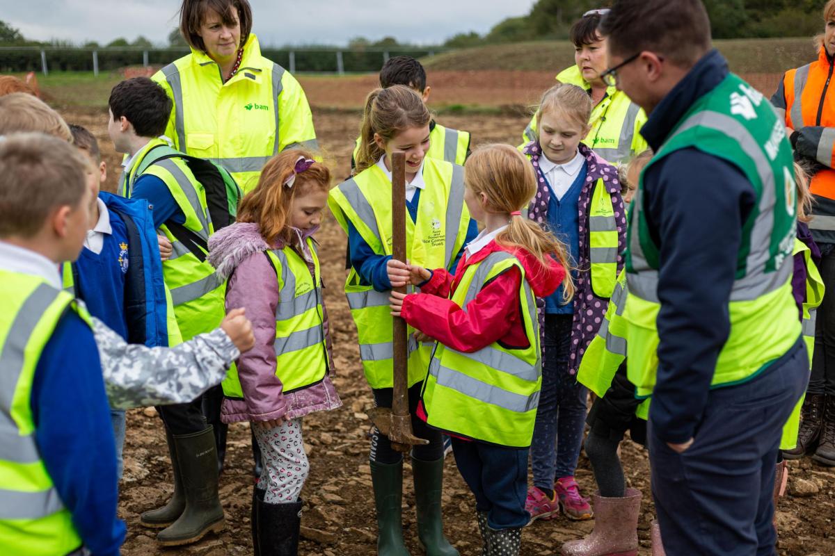A group of school children visit the site