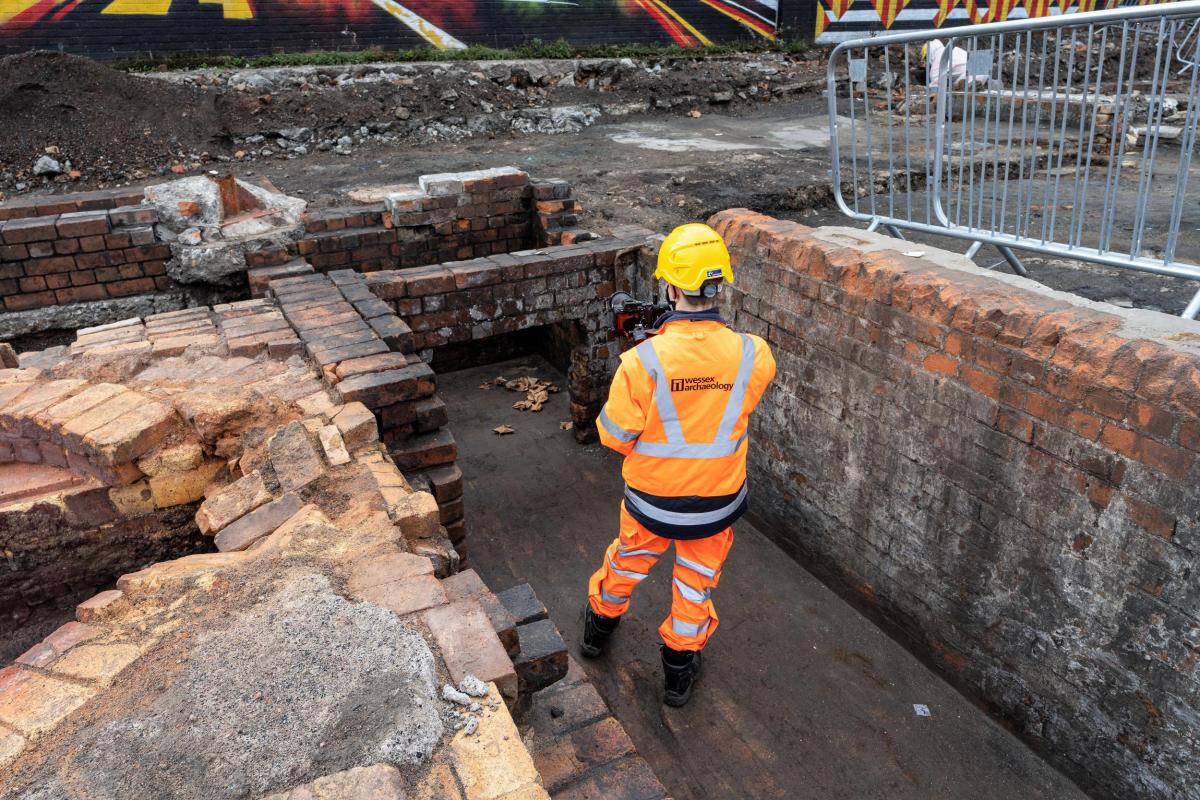 Wessex Archaeology staff member on site at Bedminster smelting work 