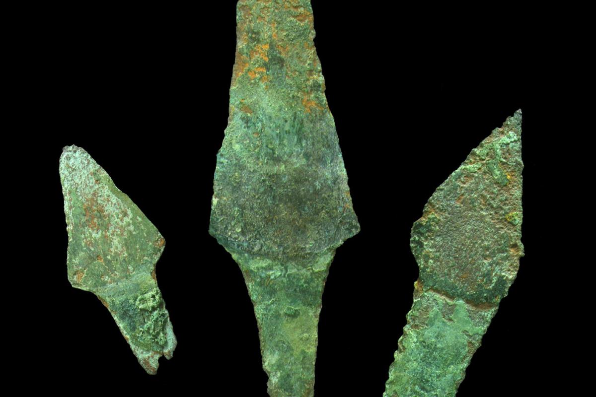 Three copper knife handles from the Amesbury Archer site.