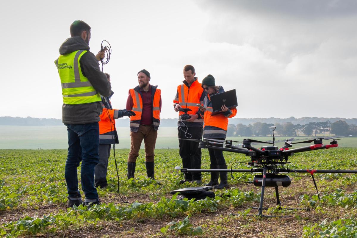 Archaeologists with a UAV