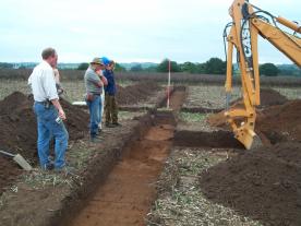 Phil Harding of Time Team excavating at Moss Brow Farm, Warburton