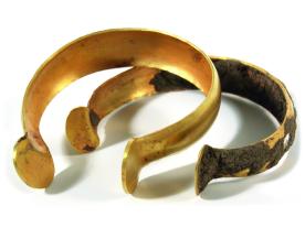 Two gold torc bracelets from East Kent as shown on the cover of Digging at the Gateway